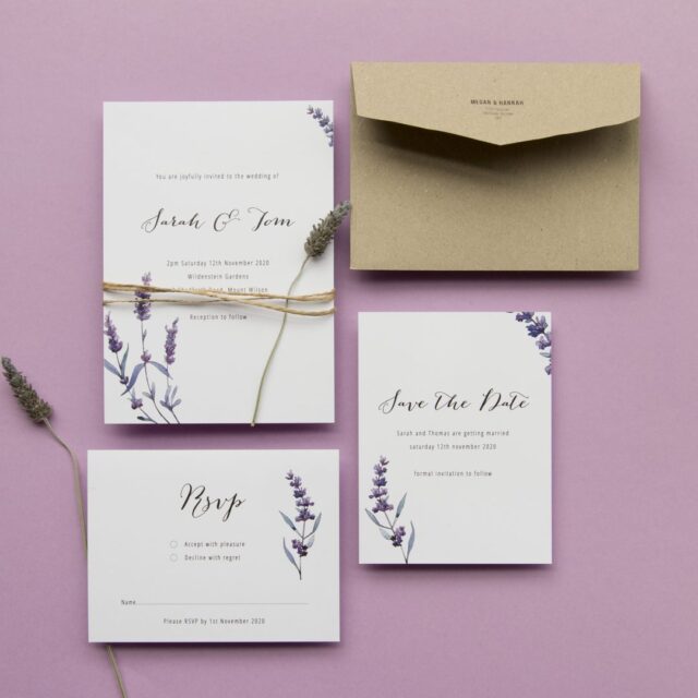 Paperlust invitation, Beautifully styled lavender-themed wedding suite flatlay with invitation