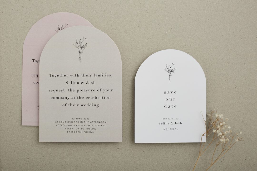 Paperlust invitation, Beautifully styled arch-shaped wedding invitation suite featuring a wedding invitation and save the date card with delicate botanical illustrations