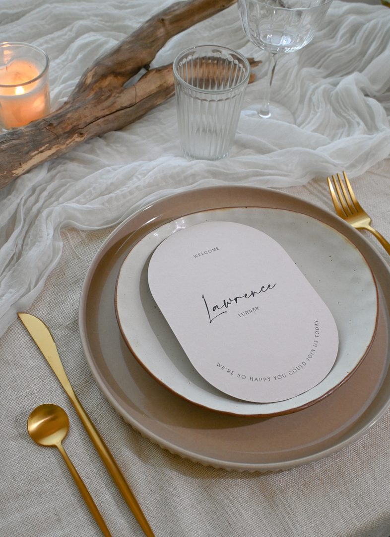 Paperlust place card, Beautifully styled place card on layered neutral plates with gold cutlery