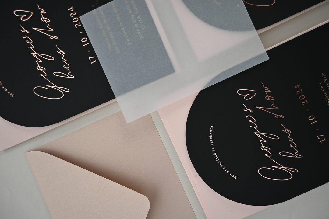 Paperlust rsvp, Elegant dark wedding invitation suite featuring rose gold foil calligraphy on black card stock with blush and vellum envelopes. Beautiful styling with luxe