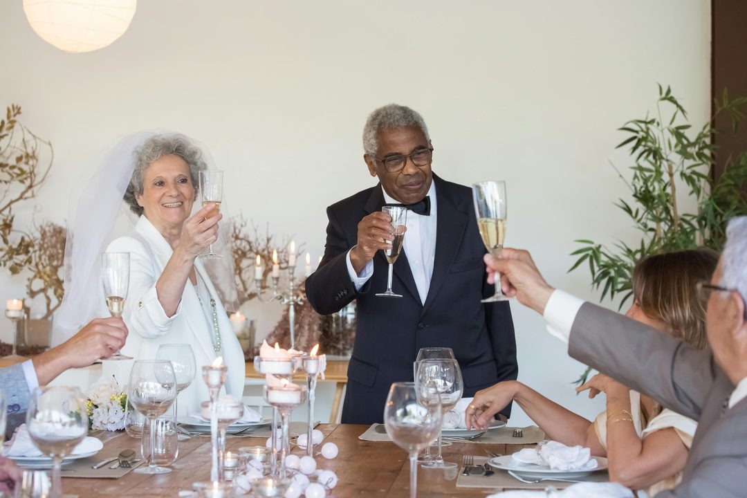 Guests celebrating a wedding with family and friends at the reception