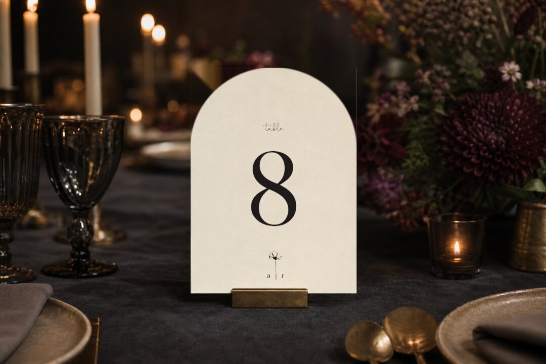 Paperlust table number, Delicate Poppy arched die-cut wedding table number on a candlelit reception table