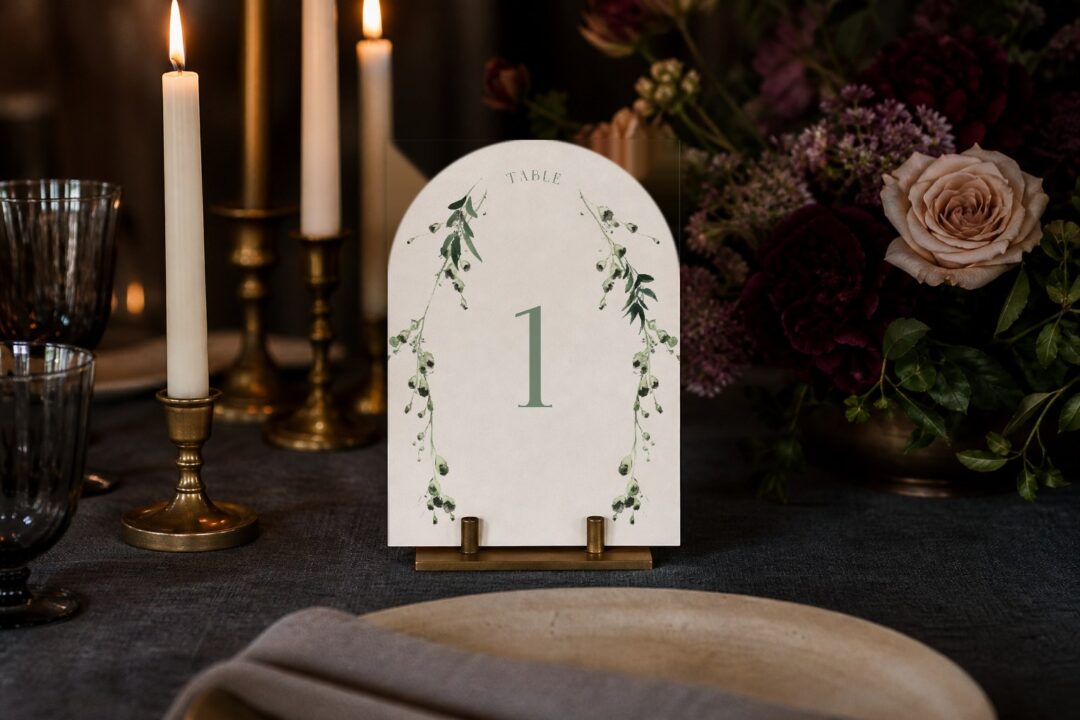 Paperlust table number, Love and Leaves arched die-cut wedding table number on a candlelit reception table