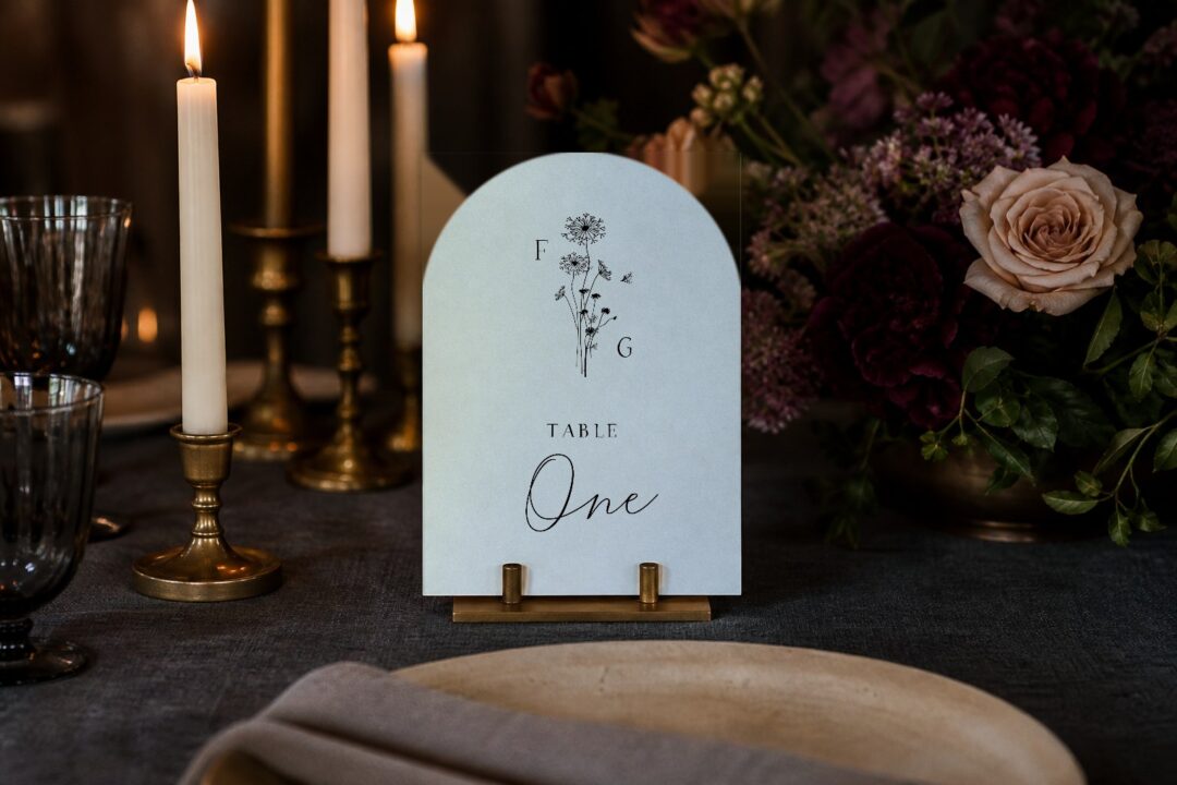 Paperlust table number, White Dandelion arched die-cut wedding table number on a candlelit reception table