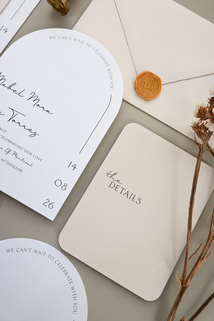 Paperlust wax seal, Beautifully styled flat lay of a modern wedding stationery suite featuring arch-shaped invitation
