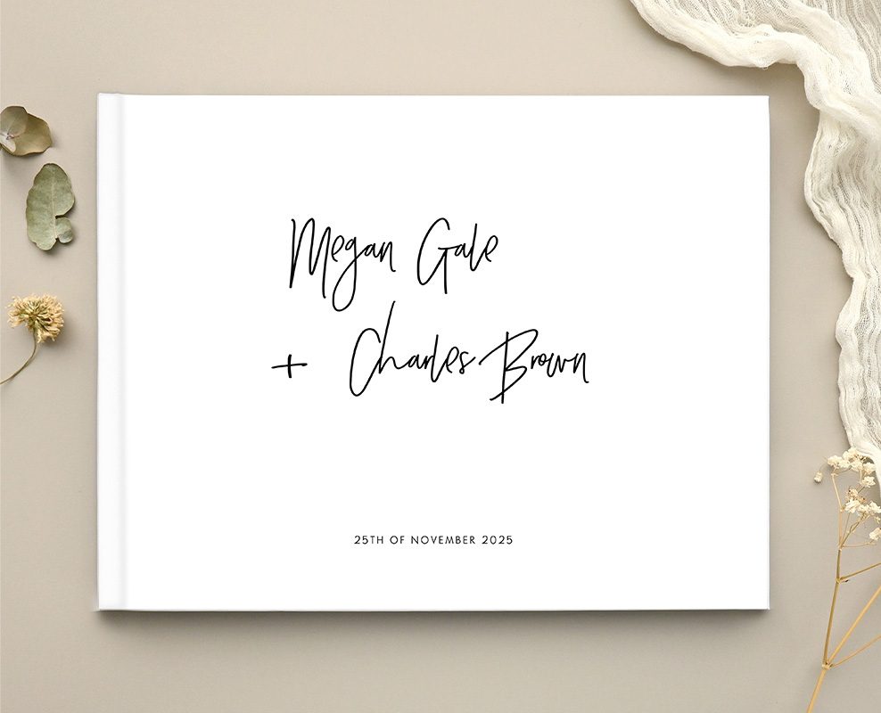 Paperlust wedding guest book with a hand-lettered calligraphy cover