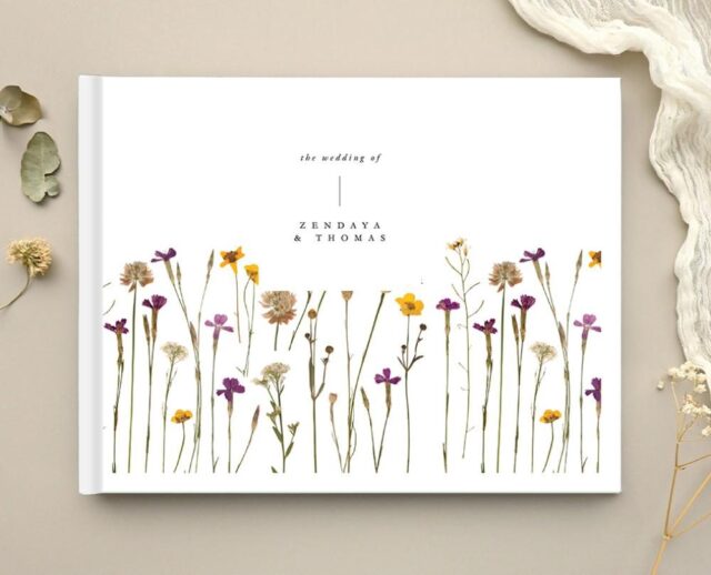 Paperlust wedding guest book with a pressed wildflower cover