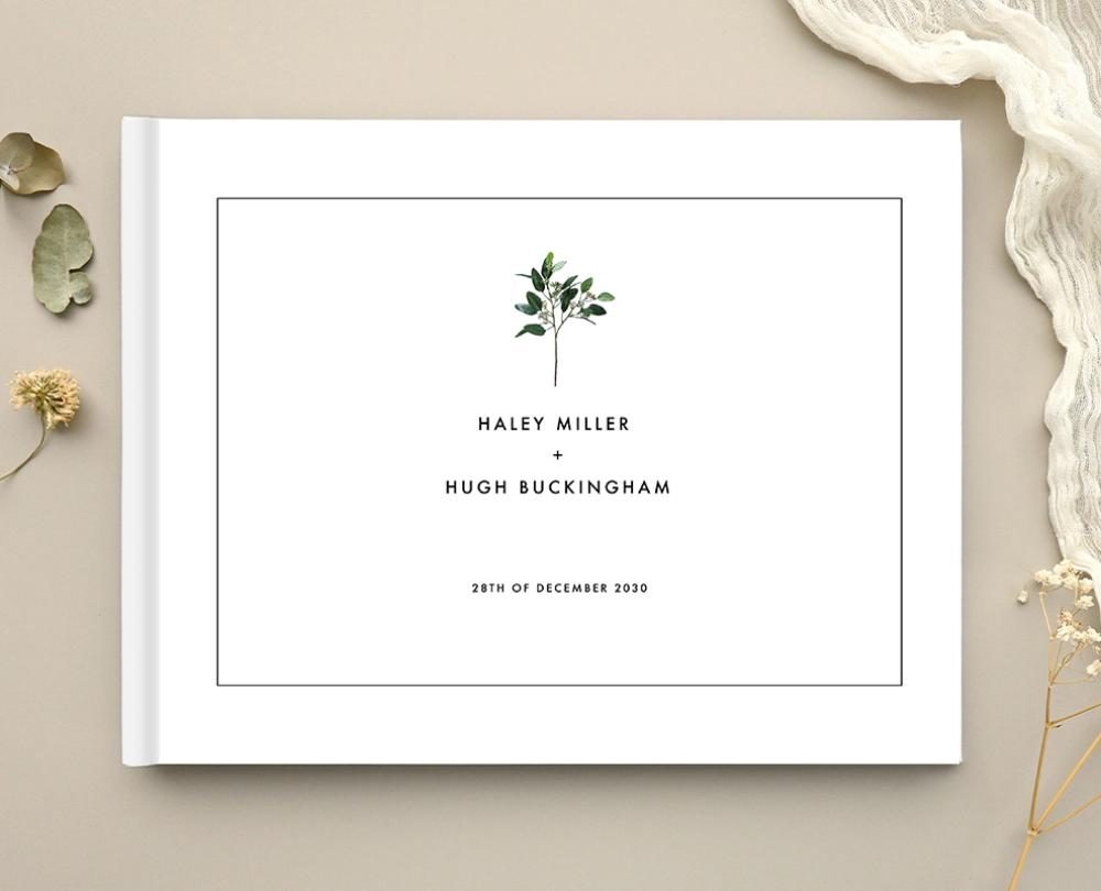 Paperlust wedding guest book with a minimalist botanical crest cover