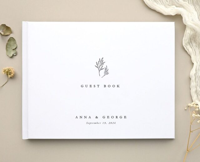 Open Paperlust wedding guest book with a classic Guest Book cover
