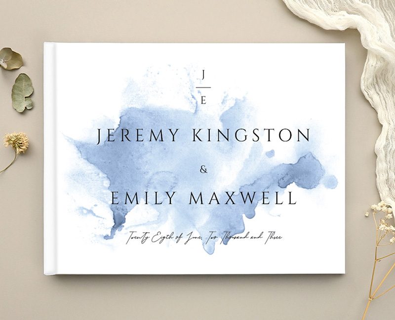 Paperlust wedding guest book with a blue watercolor cover design