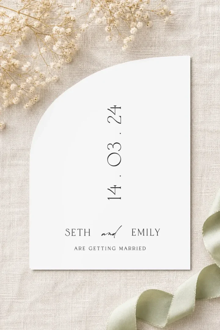 Paperlust Milk and Honey save the date, minimal half-arch card with a vertical stacked date and the couple names in fine serif