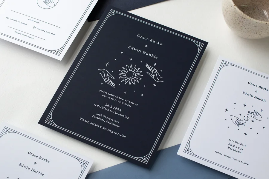 Deep navy celestial wedding invitation with white ink, Paperlust Ad Astra design