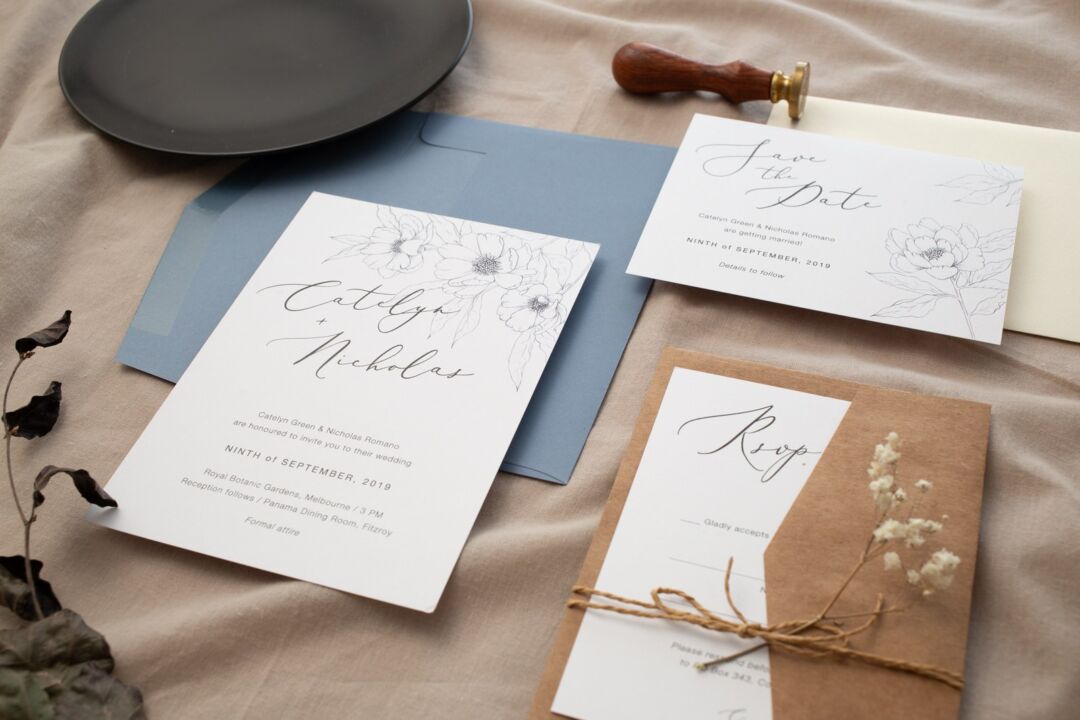 Graphite Blooms wedding invitation, save the date and RSVP card in fine line florals with a dusty blue envelope, kraft wrap and a wax seal stamp, Paperlust