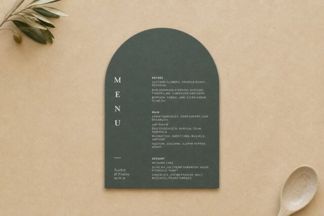 A wedding menu die-cut to a single wide arch, printed in white ink on sage green colourstock.