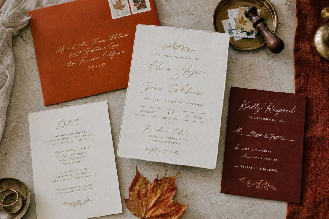 A wedding invitation setting its date as a rule-divided lockup reading Saturday 17 October 2026, with a reply card beside it.